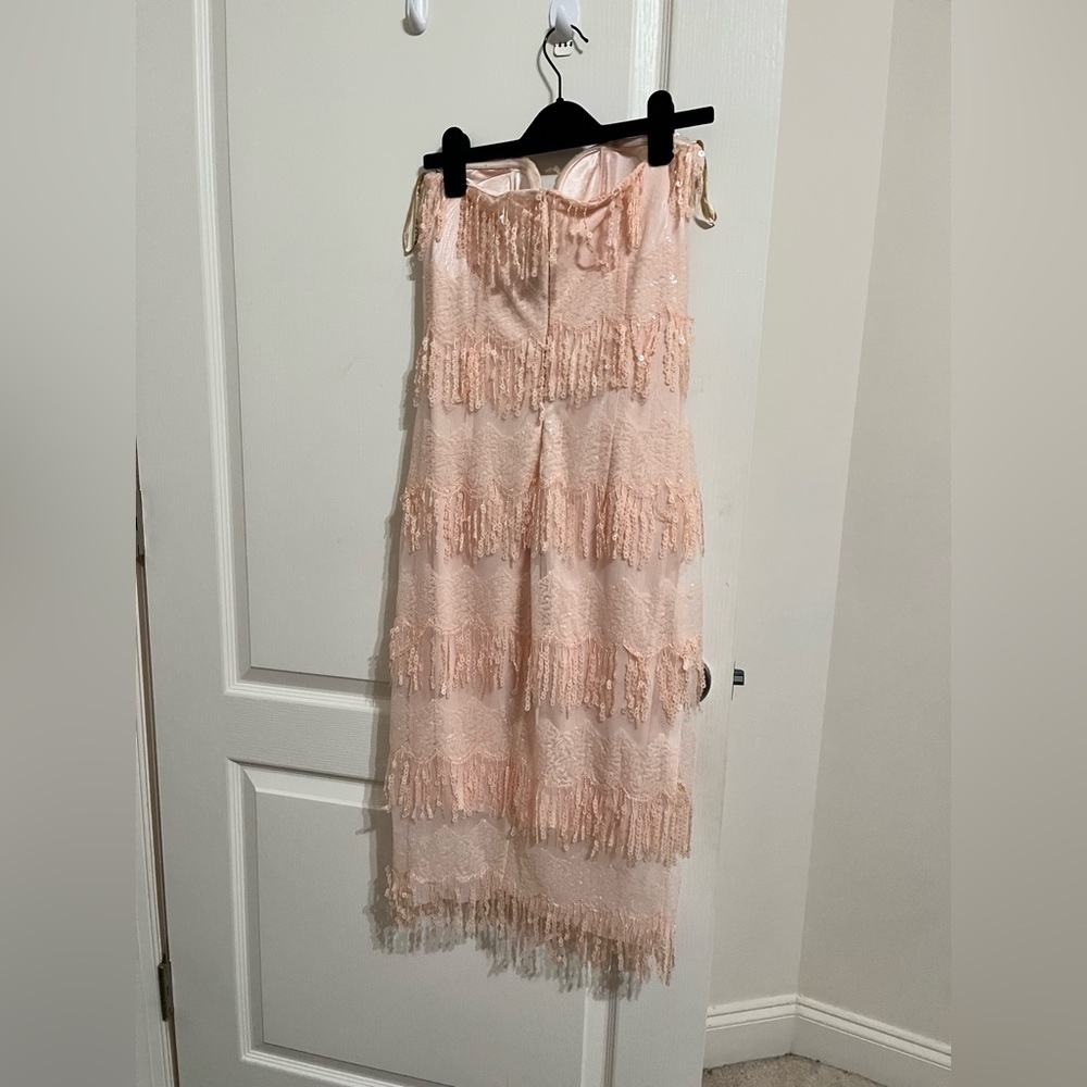 New dress, never worn before.